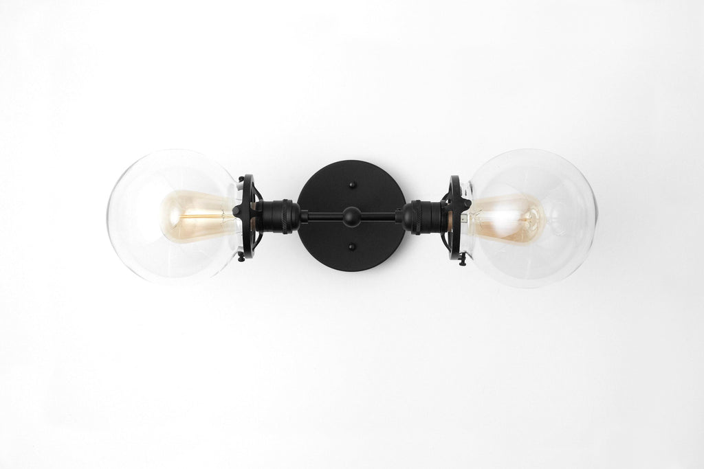 Lumio Globe klare Glas-Wandleuchte – moderne industrielle Wandlampe für Waschtisch & Flur | Souliia