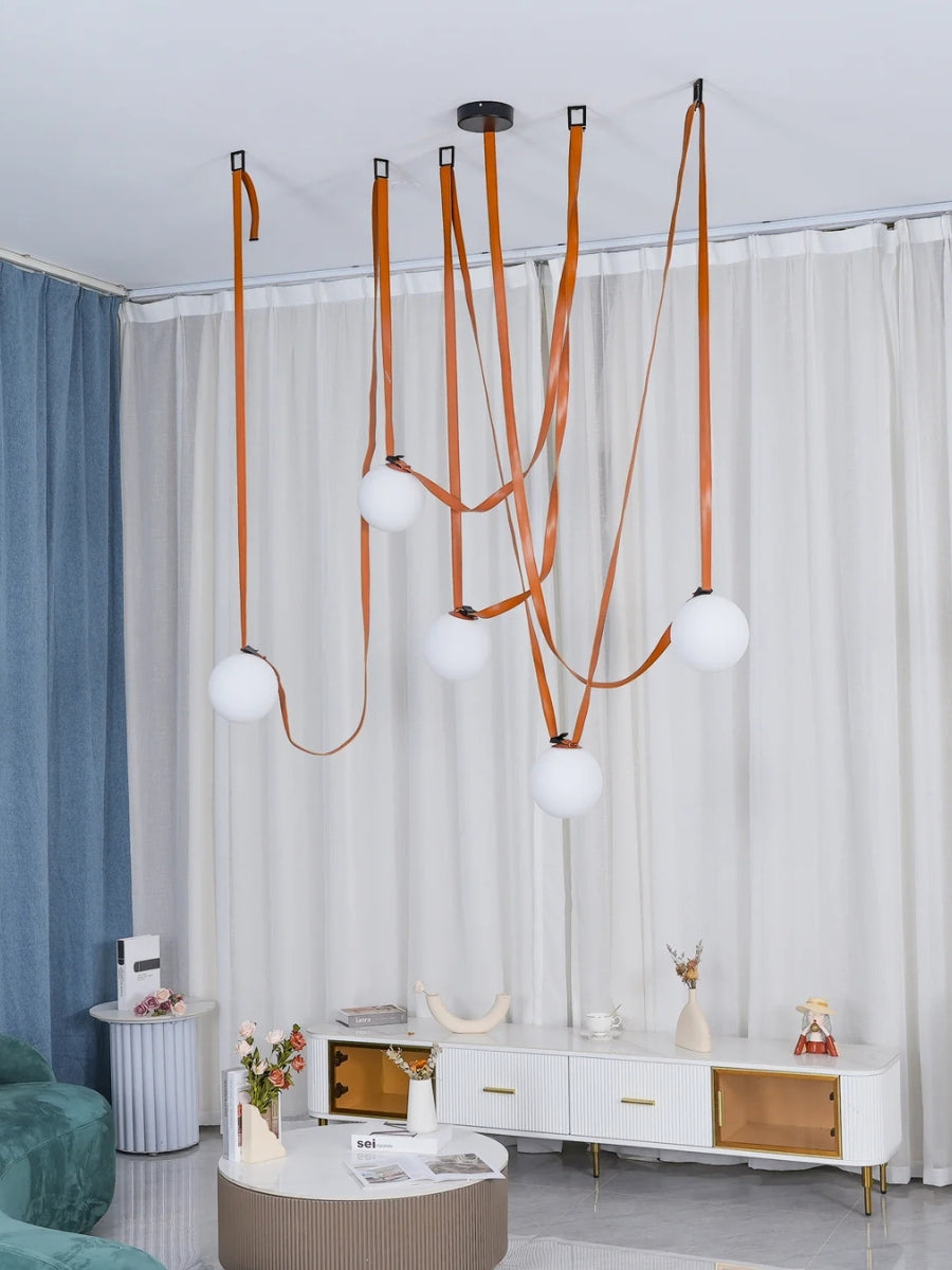 Lampada a sospensione modulare con design scultoreo a forma di cintura | Souliia