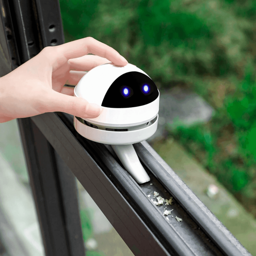 Dobíjecí USB stolní vysavač ve tvaru robota pro snadné odstraňování prachu - Souliia