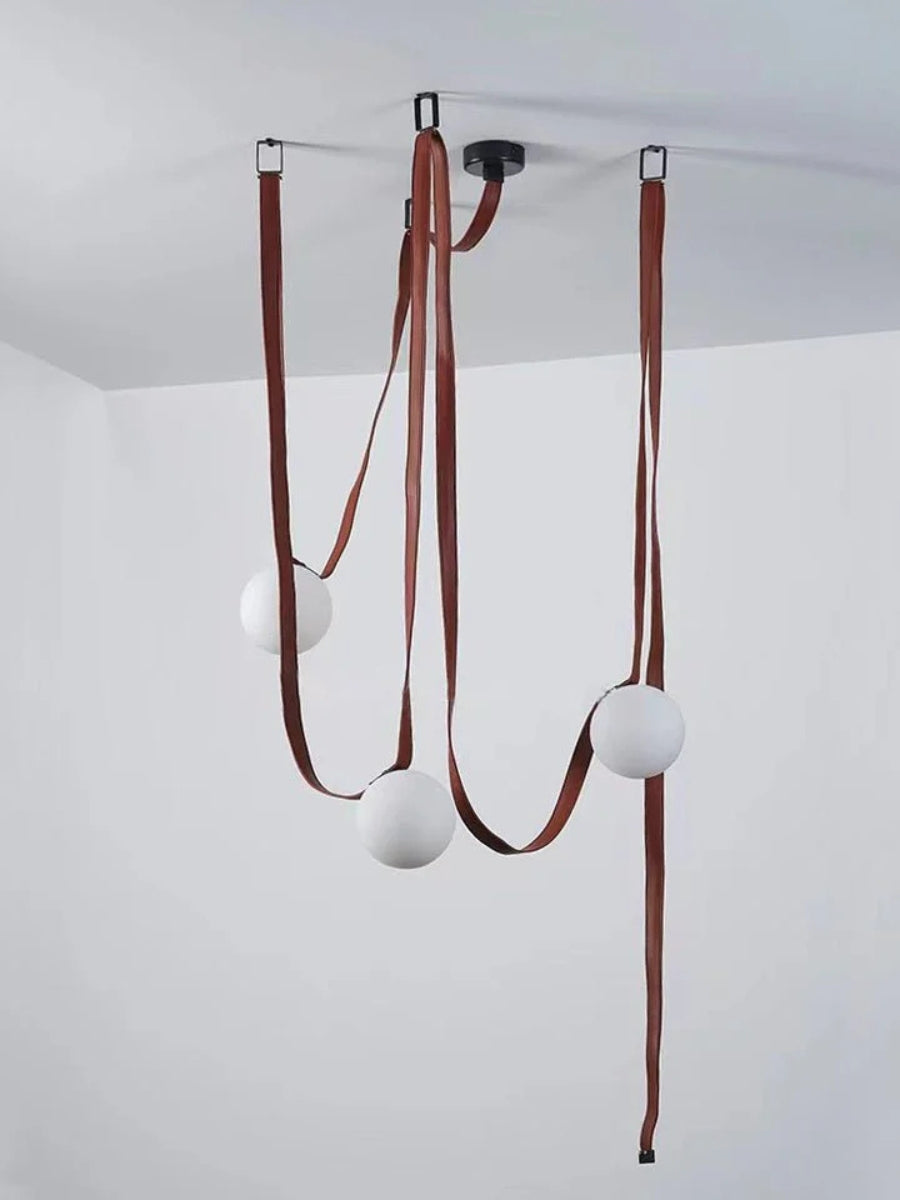Lampada a sospensione modulare con design scultoreo a forma di cintura | Souliia