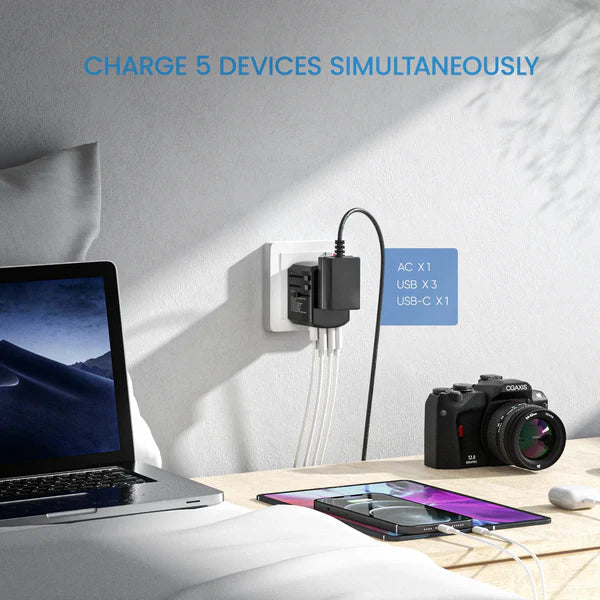 Adaptateur de voyage universel multiports — 150+ régions, recharge USB