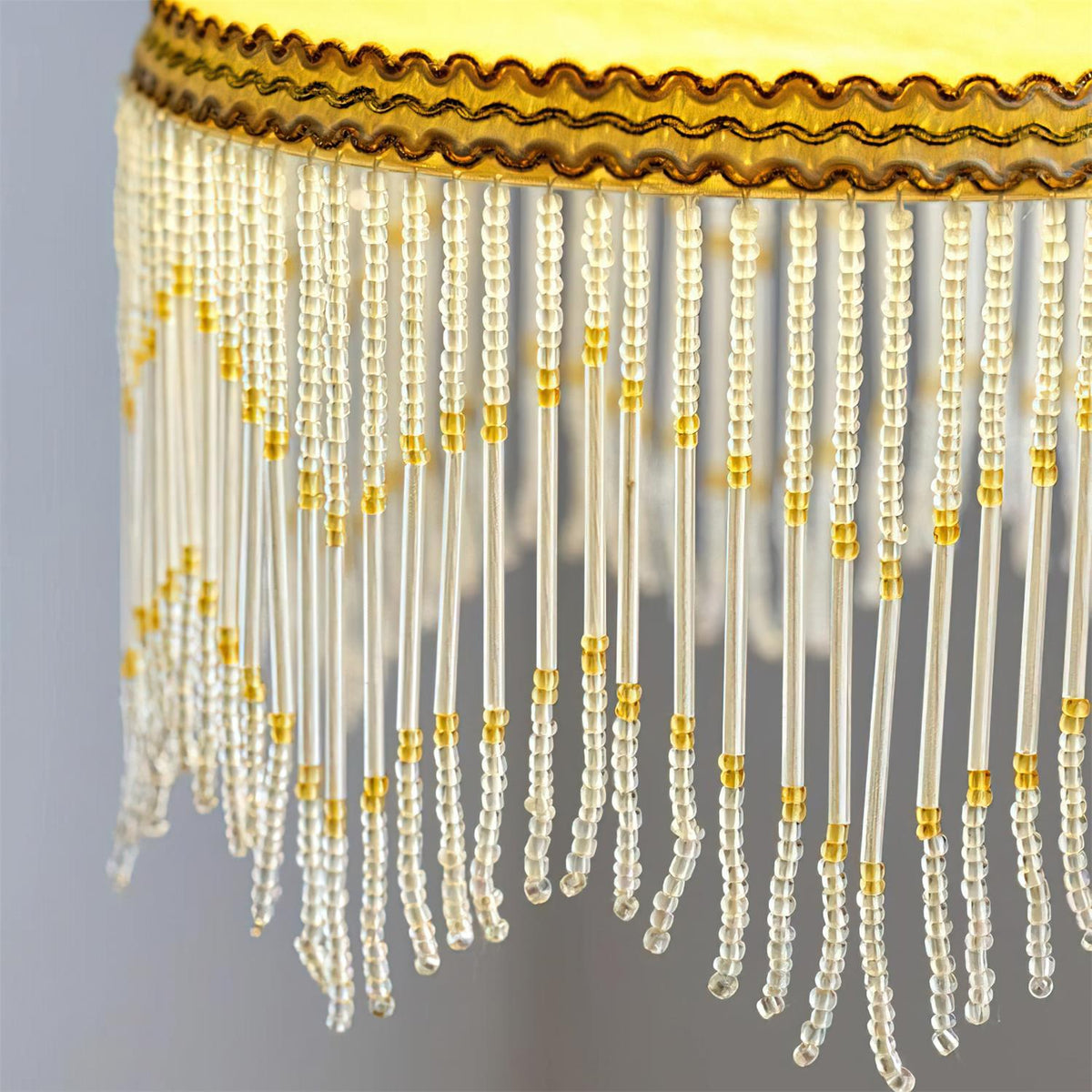 Vili Beaded Tassel Pendant Lamp – Soft Yellow Dome, Brass-Toned Top