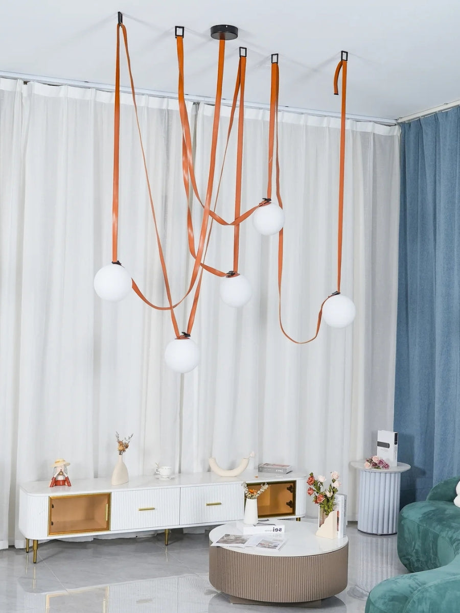 Lampada a sospensione modulare con design scultoreo a forma di cintura | Souliia