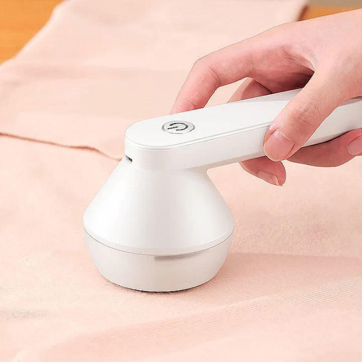 Genopladelig fnugfjerner — fjerner fnug fra tekstiler