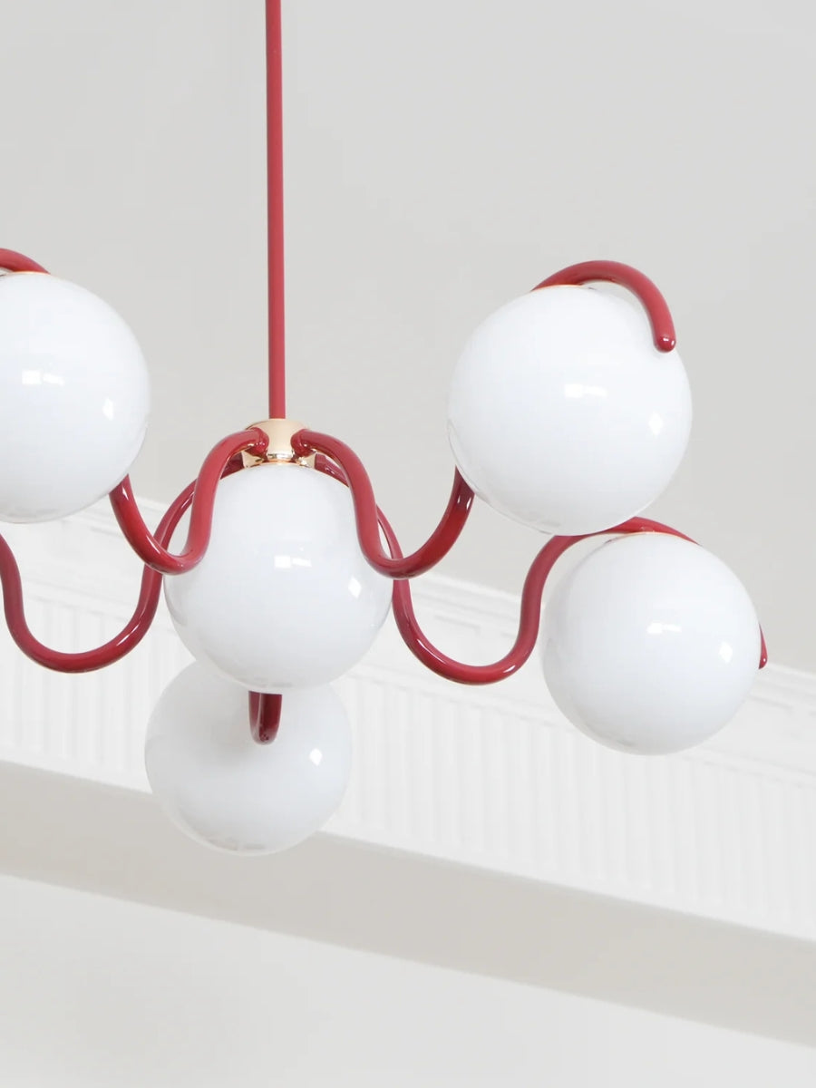 Sculptural Linear Chandelier with Elegantly Curved Profile | Souliia