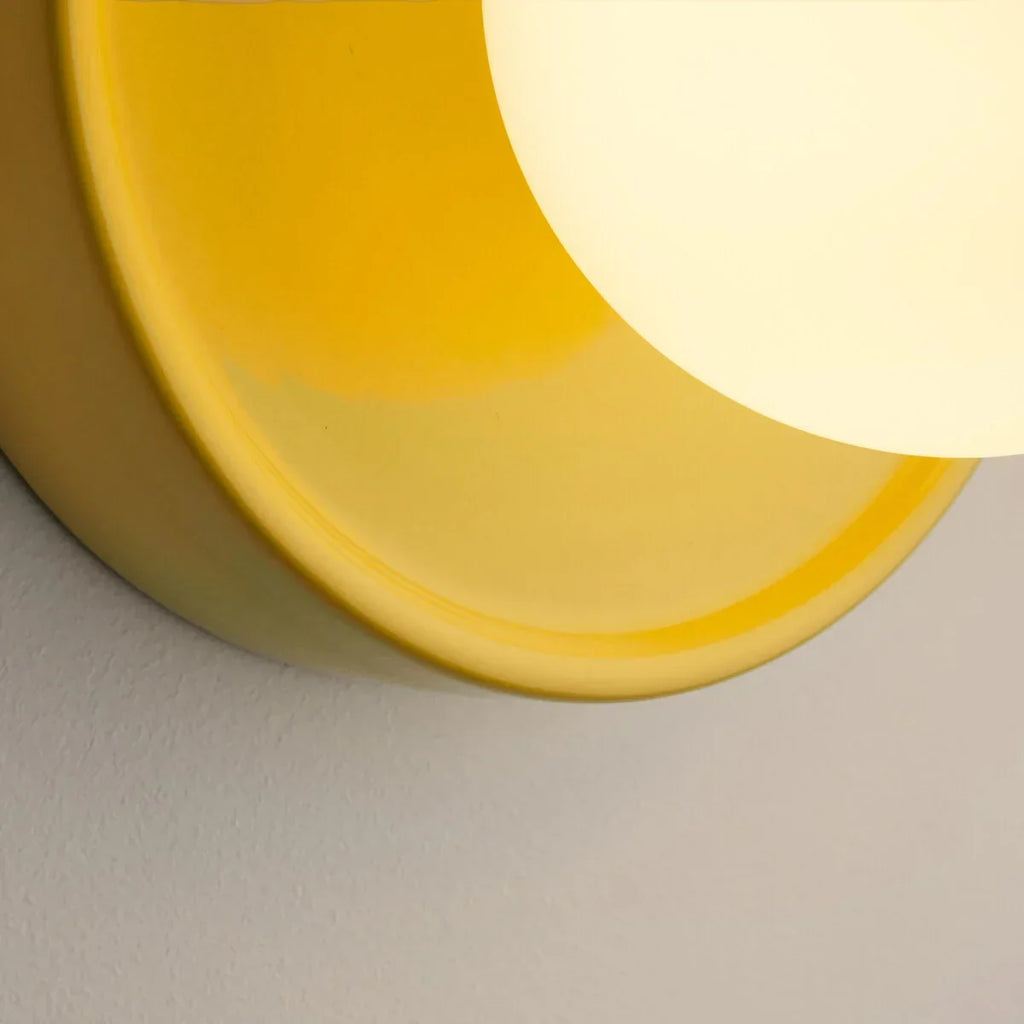 Solna Minimalist Round Glass Wall Sconce with Ceramic Base for Bedroom and Hallway | Souliia