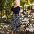 VeraNite – Robe longue audacieuse à motifs patchwork zébrés avec détail rouge - Souliia